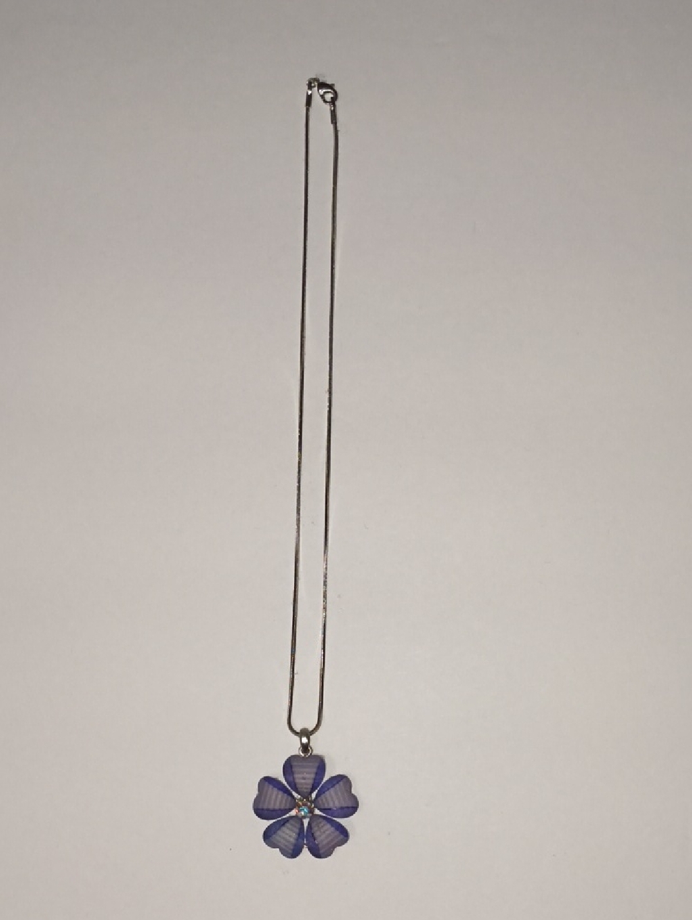 Purple Floral Pendant Necklace with Sparkling Center